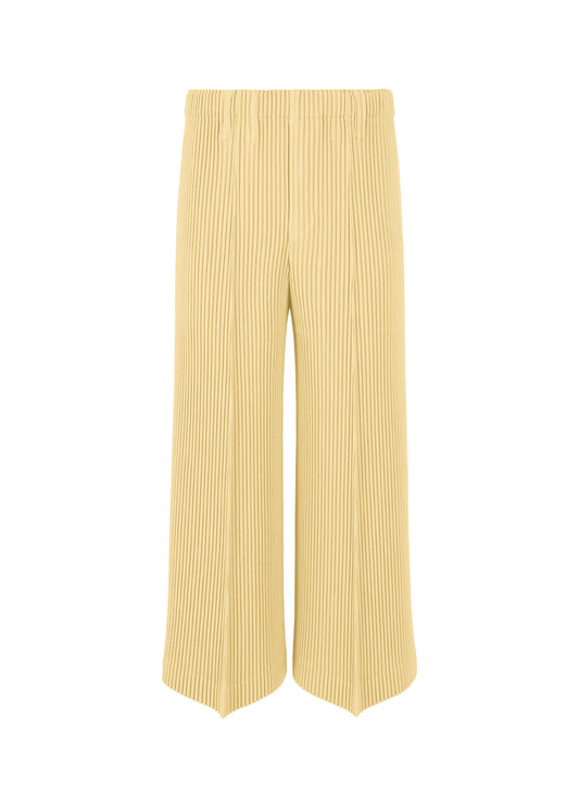 A product shot of the HOMME PLISSÉ ISSEY MIYAKE KERSEY PLEATS trousers in cream yellow.