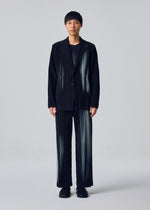 A model wears the HOMME PLISSÉ ISSEY MIYAKE IN THE SHADOW in-the-shadow-jacket-shadow-black.