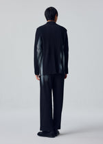 A model wears the HOMME PLISSÉ ISSEY MIYAKE IN THE SHADOW in-the-shadow-jacket-shadow-black.