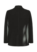A detail shot of the HOMME PLISSÉ ISSEY MIYAKE IN THE SHADOW jacket.