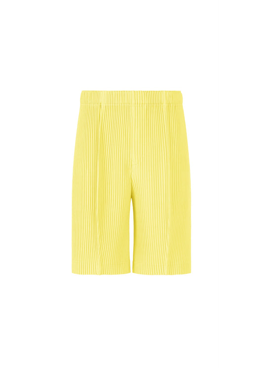A product shot of the HOMME PLISSÉ ISSEY MIYAKE MONTHLY COLORS : AUGUST shorts in shine yellow.