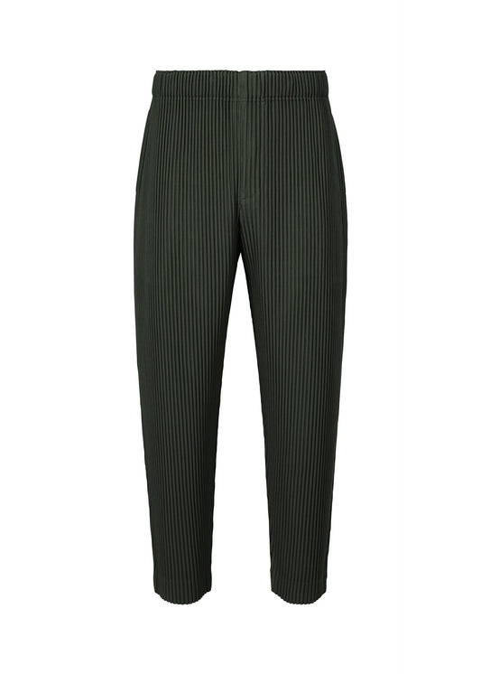 A product shot of the HOMME PLISSÉ ISSEY MIYAKE MONTHLY COLORS : AUGUST trousers in inky gray.