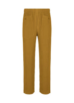 A product shot of the HOMME PLISSÉ ISSEY MIYAKE MONTHLY COLORS : OCTOBER trousers in shade dandelion.