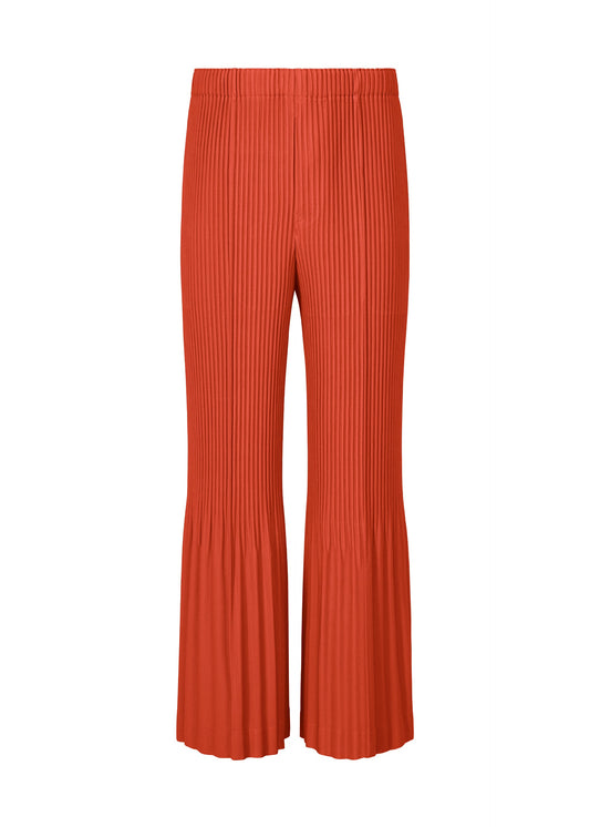A product shot of the HOMME PLISSÉ ISSEY MIYAKE PLEATS BOTTOMS 1 trousers in brightside red.