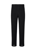 A product shot of the HOMME PLISSÉ ISSEY MIYAKE TAILORED PLEATS 1 trousers in black.