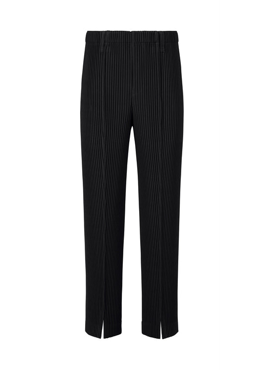 A product shot of the HOMME PLISSÉ ISSEY MIYAKE TAILORED PLEATS 1 trousers in black.