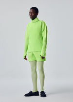 A model wears the HOMME PLISSÉ ISSEY MIYAKE COLOR PLEATS 1 color-pleats-1-shorts-shine-purple.