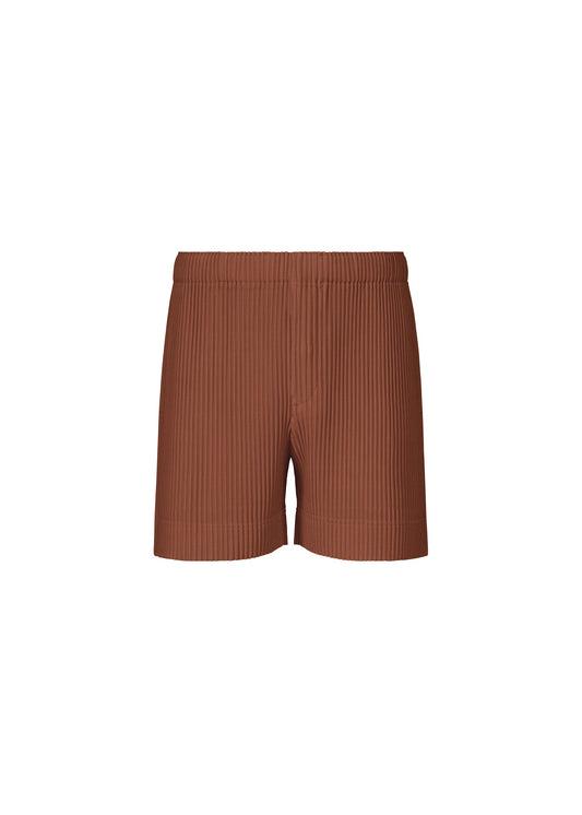 A product shot of the HOMME PLISSÉ ISSEY MIYAKE COLOR PLEATS 1 shorts in darkside brown.