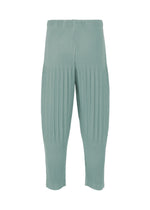 A detail shot of the HOMME PLISSÉ ISSEY MIYAKE COLOR PLEATS 2 trousers.