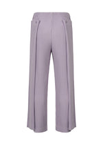 A detail shot of the HOMME PLISSÉ ISSEY MIYAKE MOTION BLUR trousers.