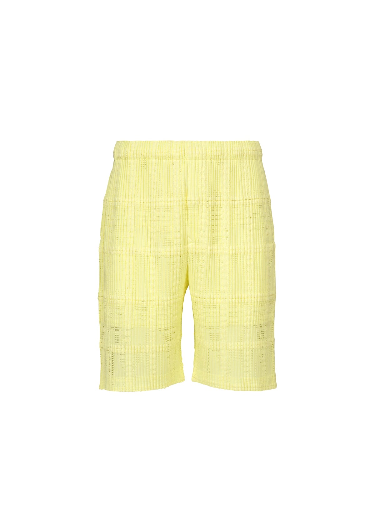 A product shot of the HOMME PLISSÉ ISSEY MIYAKE LACE GRID PLEATS shorts in yellow.