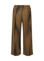 A detail shot of the HOMME PLISSÉ ISSEY MIYAKE BLEND OF LIGHTS trousers.