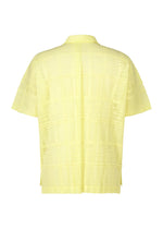 A detail shot of the HOMME PLISSÉ ISSEY MIYAKE LACE GRID PLEATS shirt.