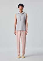 A model wears the HOMME PLISSÉ ISSEY MIYAKE MONTHLY COLORS : SEPTEMBER monthly-colors-september-top-black-2.