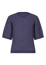 A product shot of the HOMME PLISSÉ ISSEY MIYAKE RUSTIC MESH top in blue.