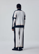 A model wears the HOMME PLISSÉ ISSEY MIYAKE FRAMEWORK : CHUSEN framework-chusen-short-sleeved-top-white.