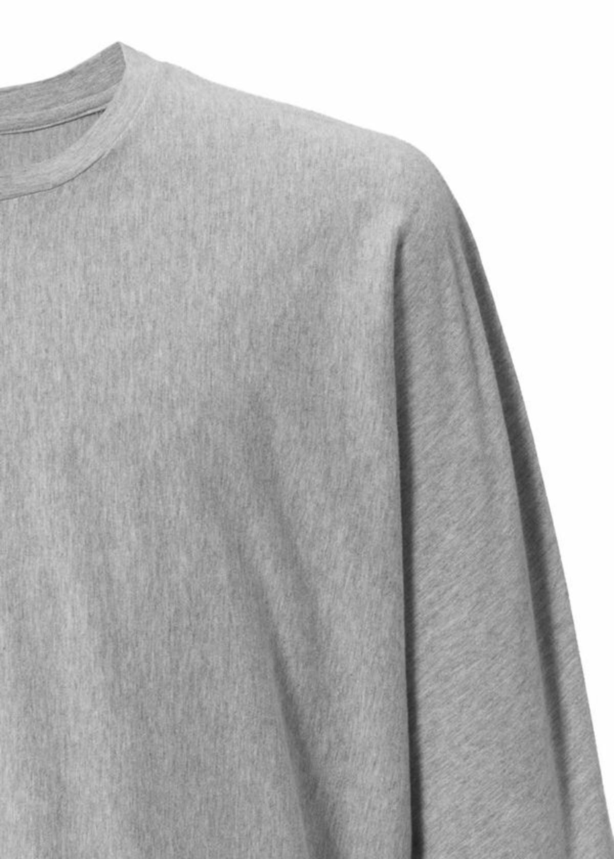 A detail shot of the HOMME PLISSÉ ISSEY MIYAKE RELEASE-T BASIC top.
