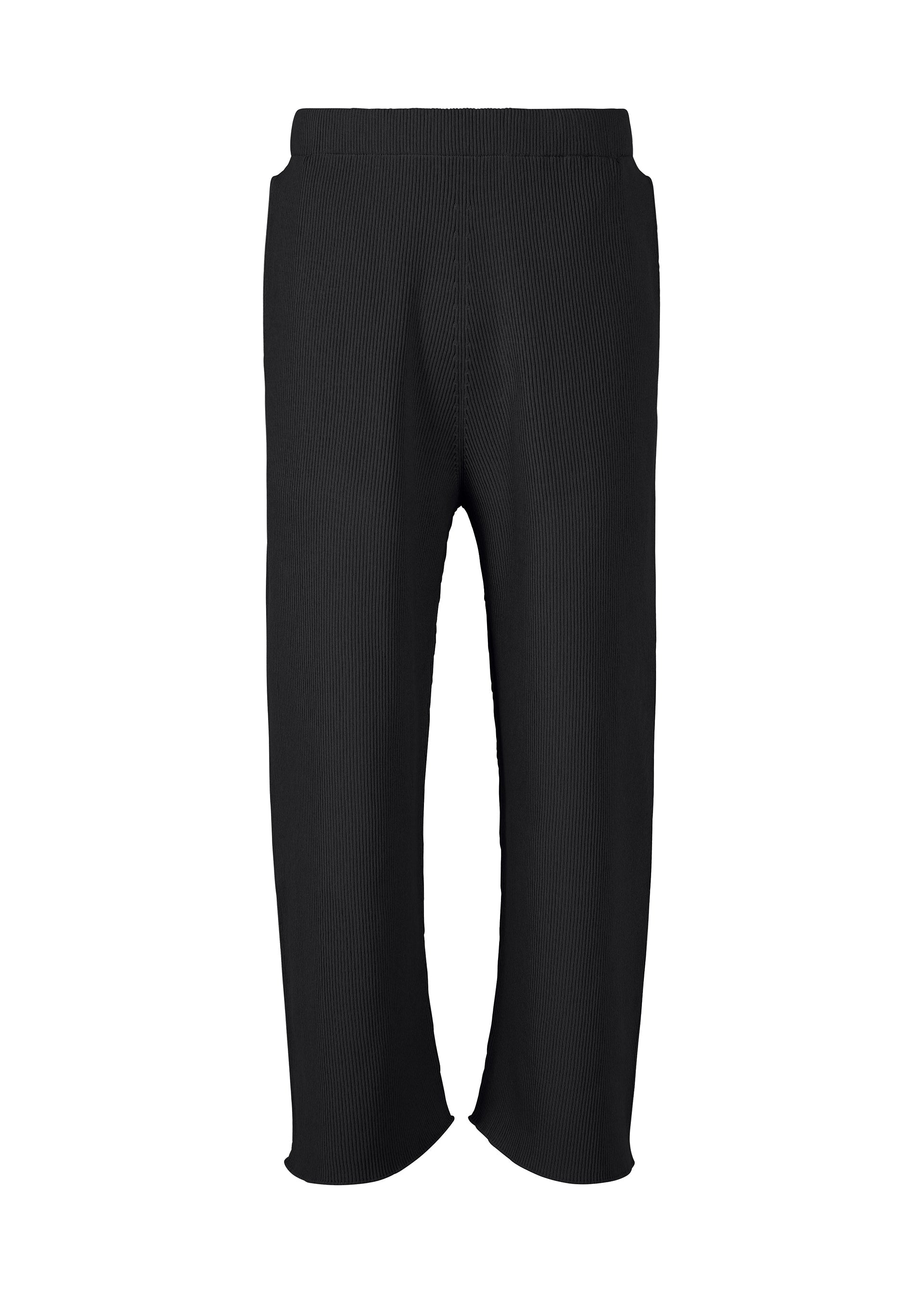 A product shot of the HOMME PLISSÉ ISSEY MIYAKE BASIC KNIT trousers in black.