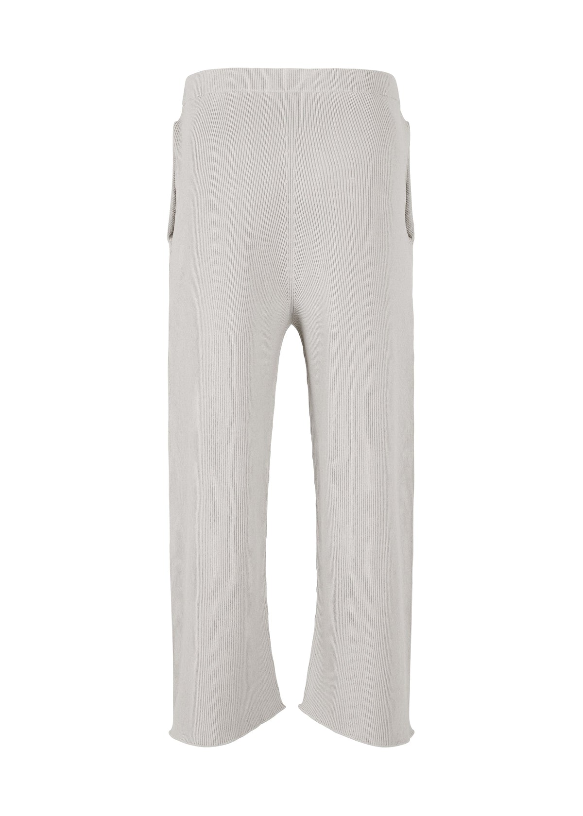 A detail shot of the HOMME PLISSÉ ISSEY MIYAKE BASIC KNIT trousers.