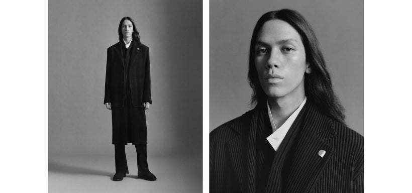 Left: Model wearing KERSEY PLEATS jacket and trousers in Black and MONTHLY COLORS : SEPTEMBER top in Black, posing straight and looking directly at the camera against a dark grey background. Black and white image. Right: Model wearing KERSEY PLEATS jacket in Black and MONTHLY COLORS : SEPTEMBER top in Black, looking directly at the camera against a dark grey background. Black and white image.