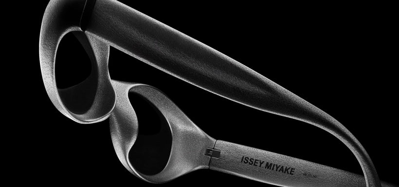 Centre: GRIT-BOSTON Dark Grey Glasses, against black background.