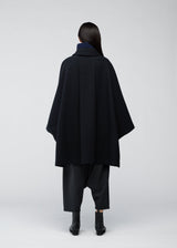 A model wears the 132 5. ISSEY MIYAKE ONE CLOTH COAT coat.