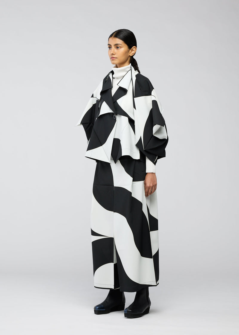 A model wears the 132 5. ISSEY MIYAKE CIRCULAR TILES jacket.