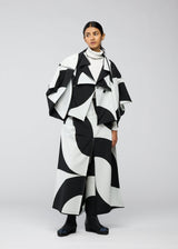 A model wears the 132 5. ISSEY MIYAKE CIRCULAR TILES jacket.