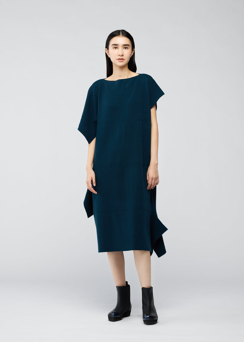 A model wears the 132 5. ISSEY MIYAKE BRICK KNIT dress.