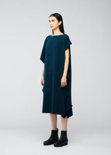 A model wears the 132 5. ISSEY MIYAKE BRICK KNIT dress.