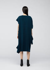 A model wears the 132 5. ISSEY MIYAKE BRICK KNIT dress.