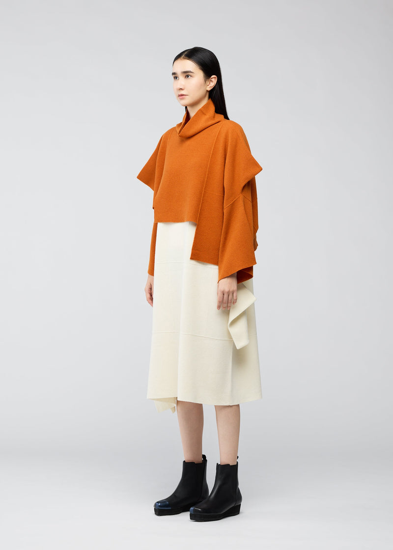 A model wears the 132 5. ISSEY MIYAKE BRICK KNIT top.