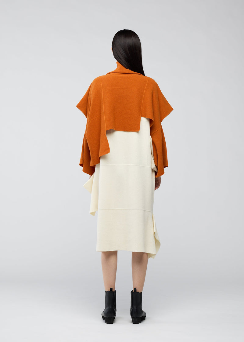 A model wears the 132 5. ISSEY MIYAKE BRICK KNIT top.