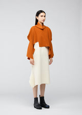 A model wears the 132 5. ISSEY MIYAKE BRICK KNIT top.