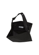 A detail shot of the 132 5. ISSEY MIYAKE PARALLELEPIPED bag.
