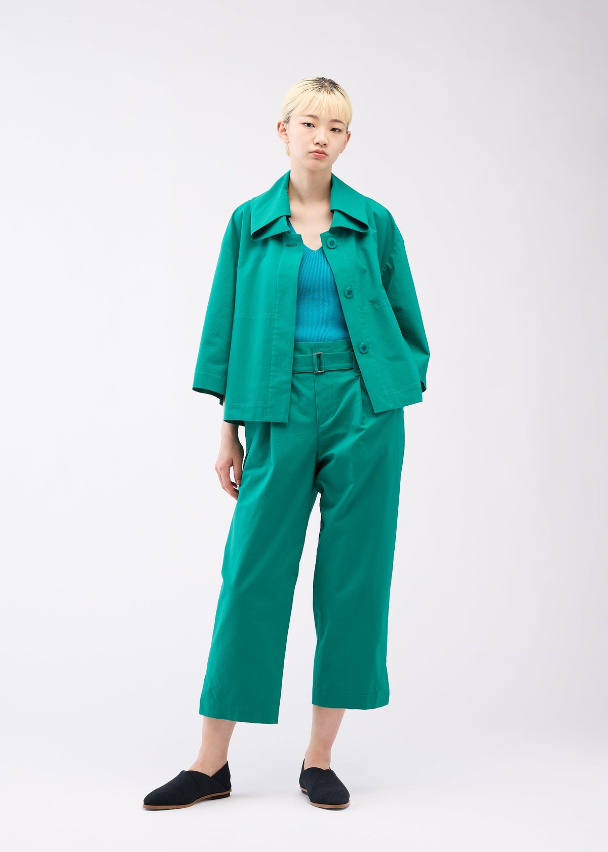 A model wears the 132 5. ISSEY MIYAKE WASHI STRETCH jacket.