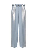 A product shot of the 132 5. ISSEY MIYAKE TUCKED FOIL trousers in light blue (71).