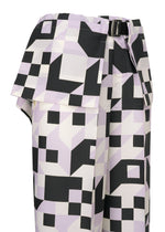 A detail shot of the 132 5. ISSEY MIYAKE BOX COMPOSITION trousers.