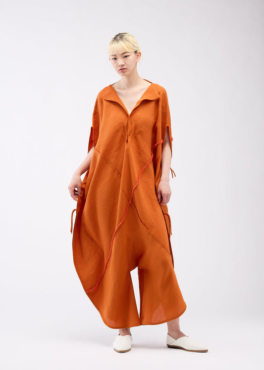 A model wears the 132 5. ISSEY MIYAKE QUADRANT CYCLE jumpsuit.