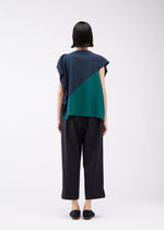 A model wears the 132 5. ISSEY MIYAKE FLAT T BI COLOR shirt.