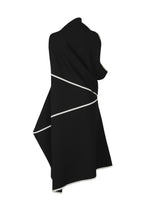 A detail shot of the 132 5. ISSEY MIYAKE HALF CUBE PATTERN KNIT dress.