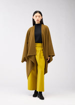 A model wears the 132 5. ISSEY MIYAKE DRAPE COAT coat.