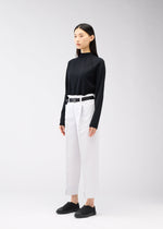 A model wears the 132 5. ISSEY MIYAKE 132 5. FLAT 1 trousers.