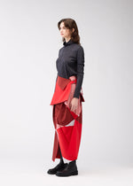 A model wears the 132 5. ISSEY MIYAKE POSITIONS skirt.