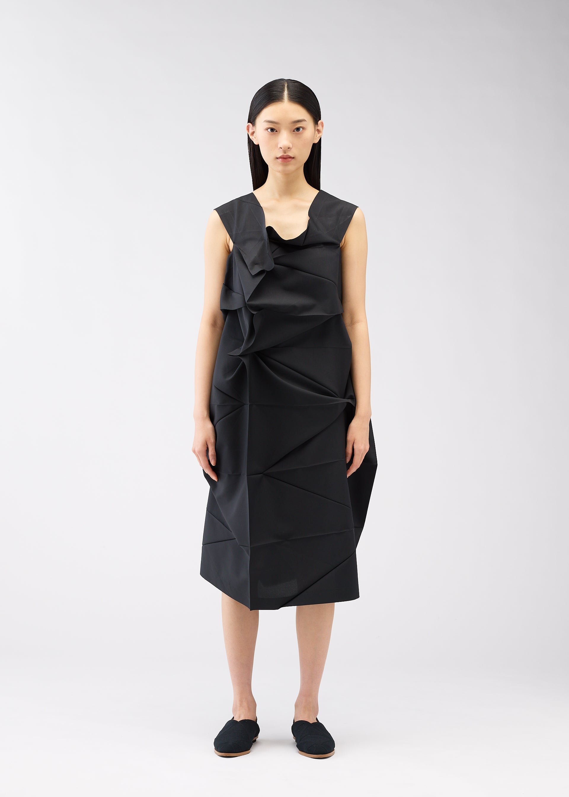 A model wears the 132 5. ISSEY MIYAKE NO.2 dress.
