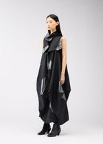 A model wears the 132 5. ISSEY MIYAKE NO.16 FOIL dress.
