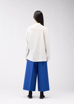 A model wears the 132 5. ISSEY MIYAKE CLEANCUT WOOL clothing.