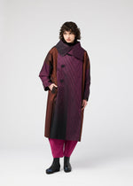A model wears the 132 5. ISSEY MIYAKE GRADATION COAT clothing.