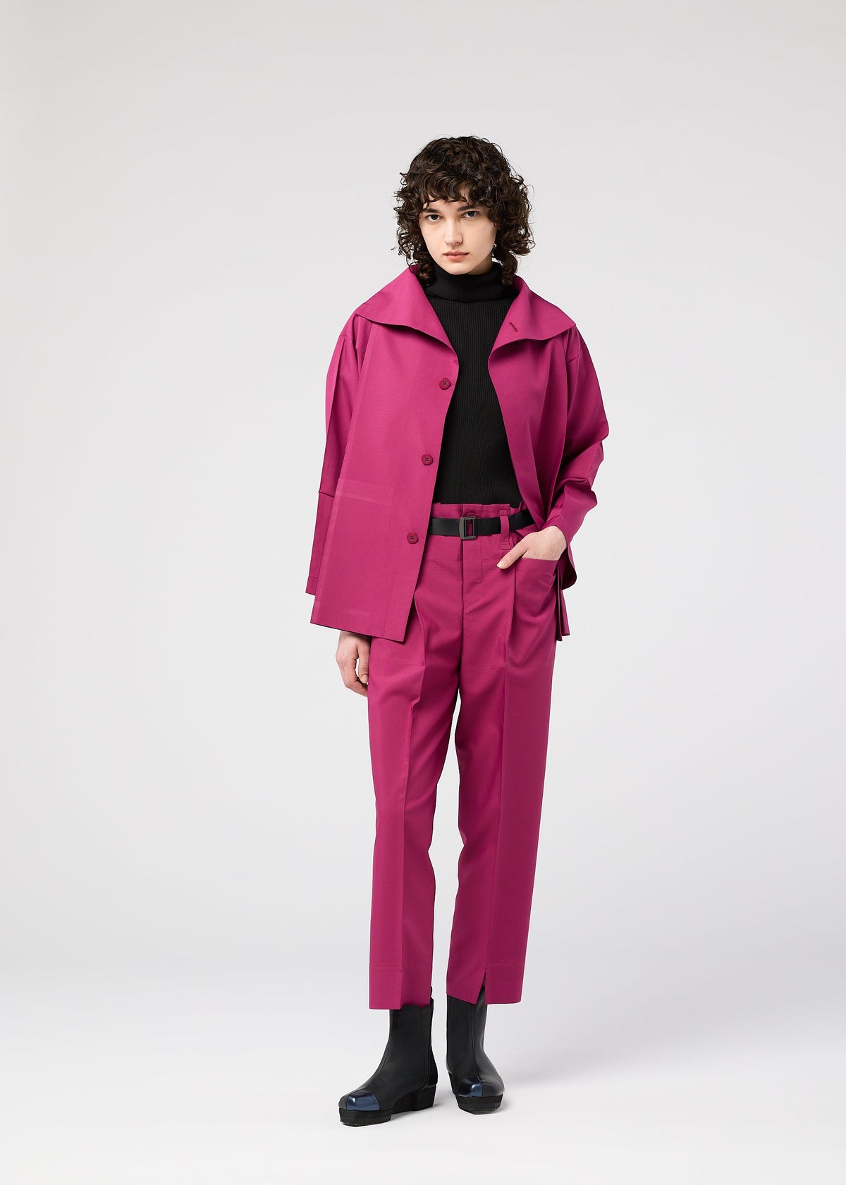 A model wears the 132 5. ISSEY MIYAKE 132 5. FLAT 1 jacket.