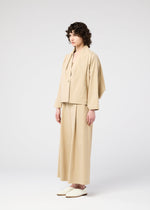 A model wears the 132 5. ISSEY MIYAKE WASHI STRETCH jacket.